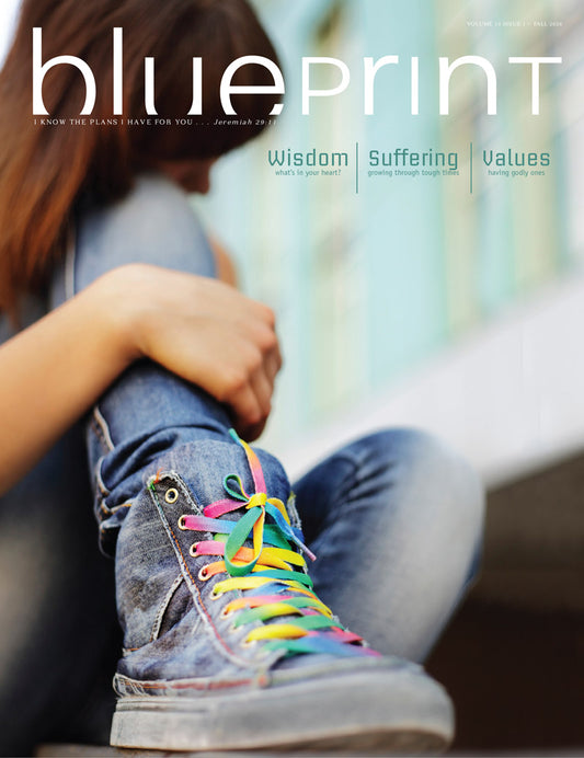 Magazine cover titled 'blueprint' with a person wearing colorful sneakers.